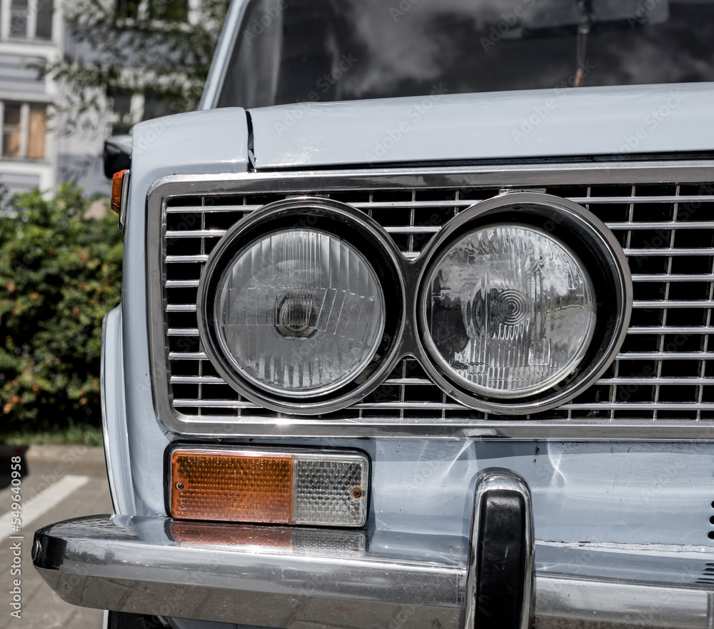 Closeup headlights of retro car.