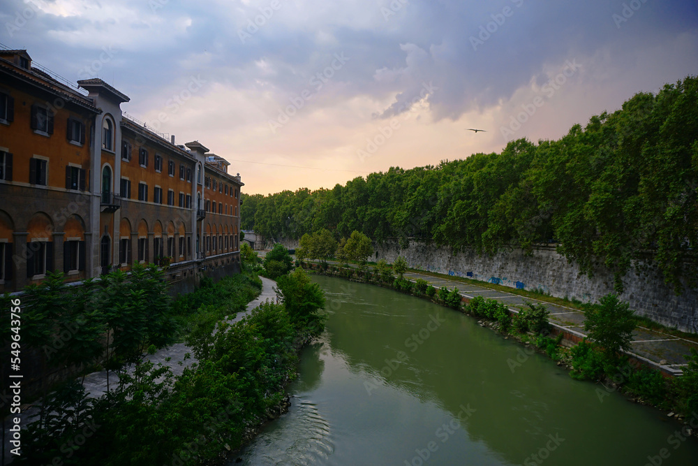 Fototapeta premium View over Tiber River with Fatebenefratelli Hospital on Tiber Island, Rome, Italy