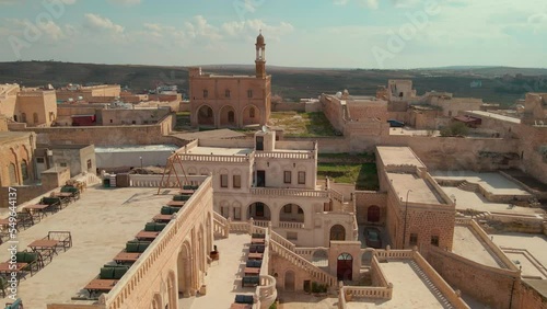 General view of Midyat city with drone, Midyat is a district of Mardin province. The history of Midyat can be traced back to the Hurrians during the 3rd millennium, Turkey. photo