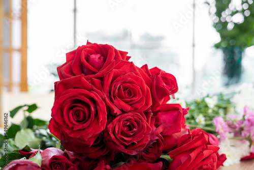 group of female florists Asians are arranging flowers for customers who come to order them for various ceremonies such as weddings  Valentine s Day or to give to loved ones.