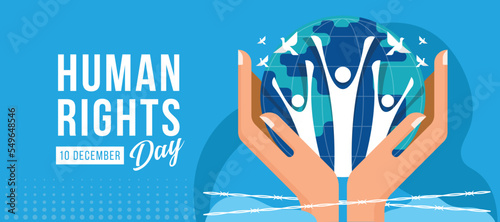 Human Rights Day - hands hold globe world with human raising hands and white bird flying around on blue background vector design photo