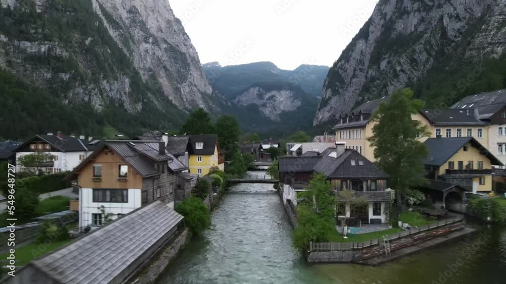 Sunset aerial view of Hallstatt lake in Austria with mountains Sunset aerial view of Hallstatt lake in Austria with mountains