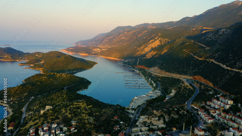 Town of Kas surrounded by sea bay and mountains. Aerial view from above. Travel to Turkey.