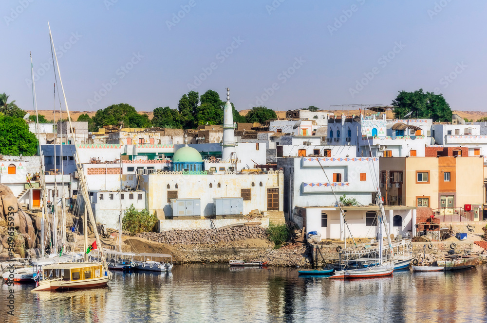 Egypt, Aswan Governorate, Aswan, Nubian village on bank of Nile river Egypt, Aswan Governorate, Aswan, Nubian village on bank of Nile river