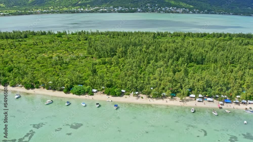 Aerial View of Ile aux Benitiers Beach by Mauritius Island, La Gaulette Town and Green Tropical Lush, Revealing Drone Shot Aerial View of Ile aux Benitiers Beach by Mauritius Island, La Gaulette Town and Green Tropical Lush, Revealing Drone Shot
