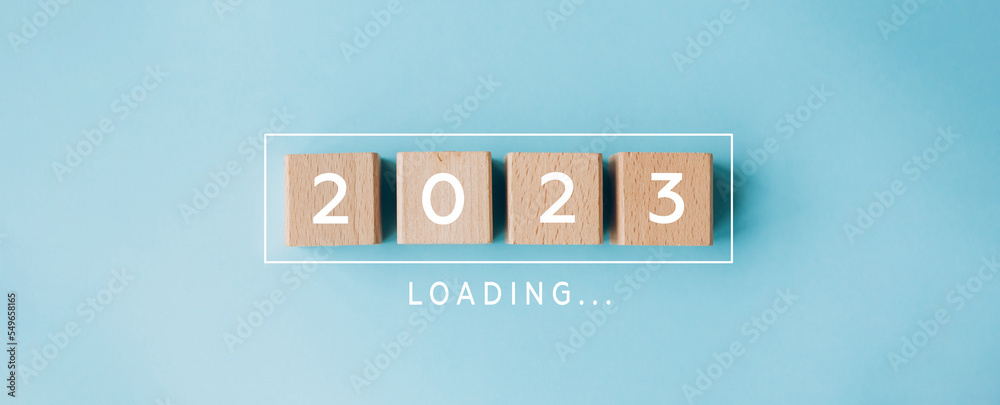 2023 New Year Loading. Loading bar with wooden blocks 2023 on blue background. Start new year 2023 with goal plan, goal concept, action plan, strategy, new year business vision. - obrazy, fototapety, plakaty 