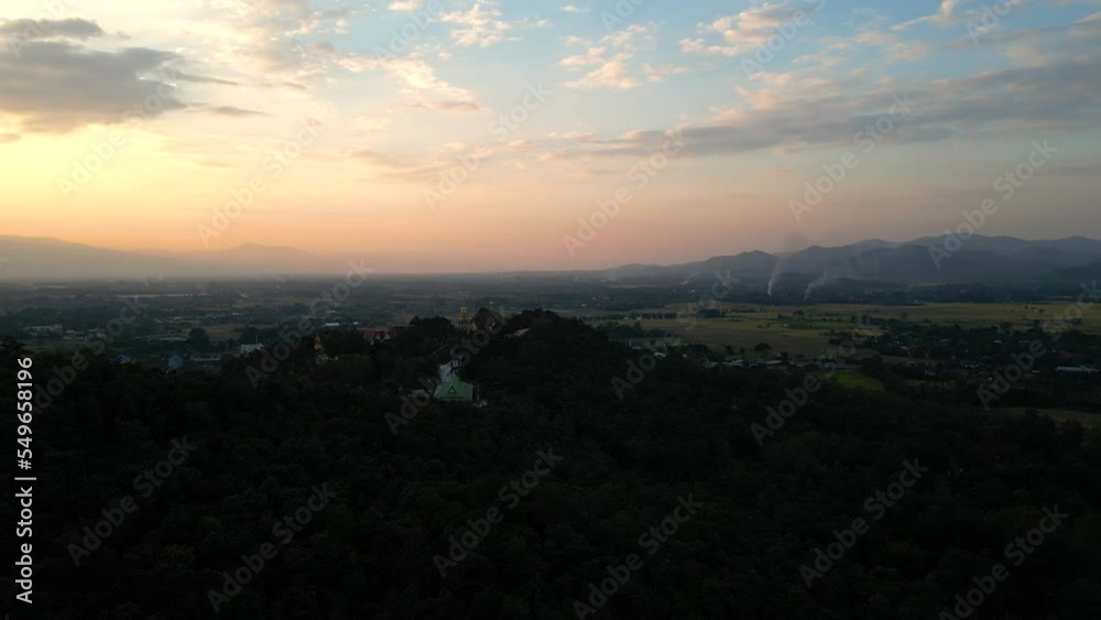 Beautiful sunset view over wide open Thai landscape from above