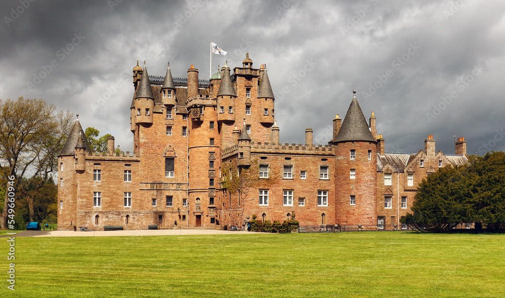 Scotland - Glamis castle at nice day with blue sky Scotland - Glamis castle at nice day with blue sky