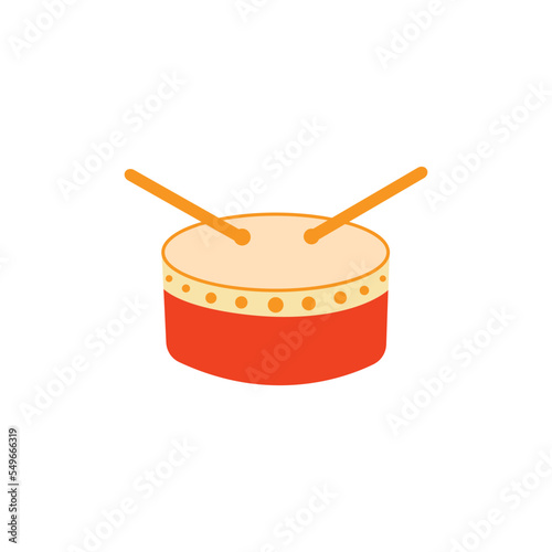 Orange drum and wooden drum sticks. Musical instrument.