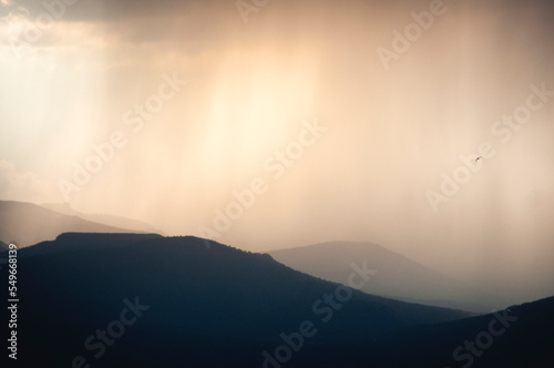Rain falls on the hills at sunset in Alava, Pais Vasco, Spain
