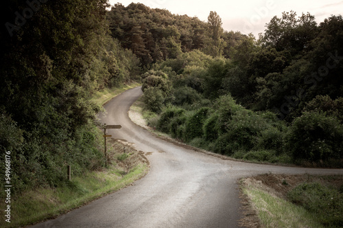 A crossroads of country roads surrounded by forests in Lantaron, Araba, Pais Vasco, Spain
