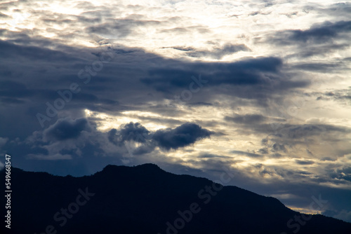 Dark cloud background with mountain silhouette
