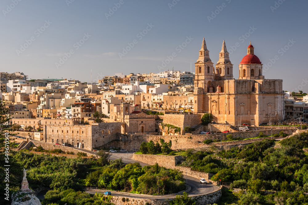 Il-Mellieha, Malta -  Mellieha town at sunny day with Paris Church on hill top