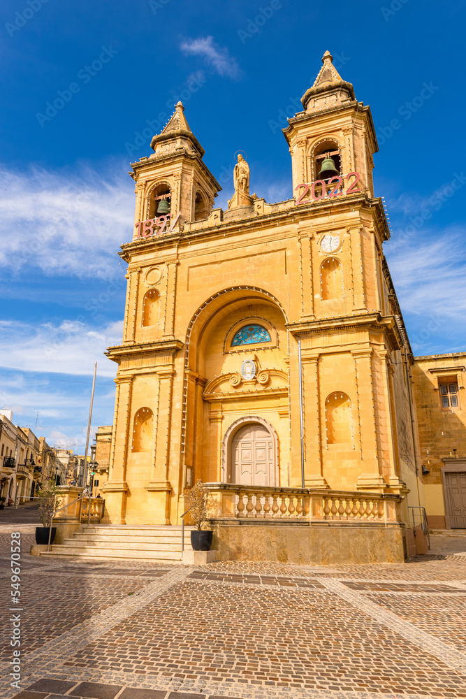 Marsaxlokk fishing village in Malta and Sanctuary of Our Lady of Pompei parish church