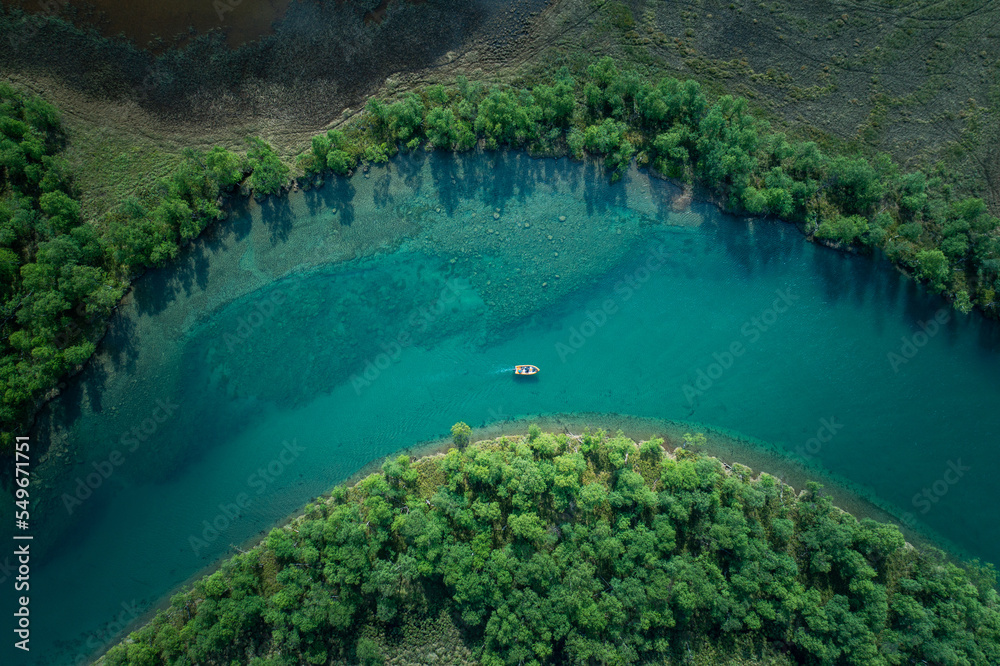 Drone View Over Fisherman in Glacial River, Swedish Lapland Drone View Over Fisherman in Glacial River, Swedish Lapland
