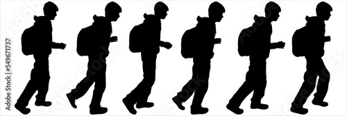 Black silhouette, a schoolboy with a backpack. Pupil stands carrying on back going to school concept. Come back to school. Idea education. Rucksack. 1 September, start lessons. Knapsack. Side view.