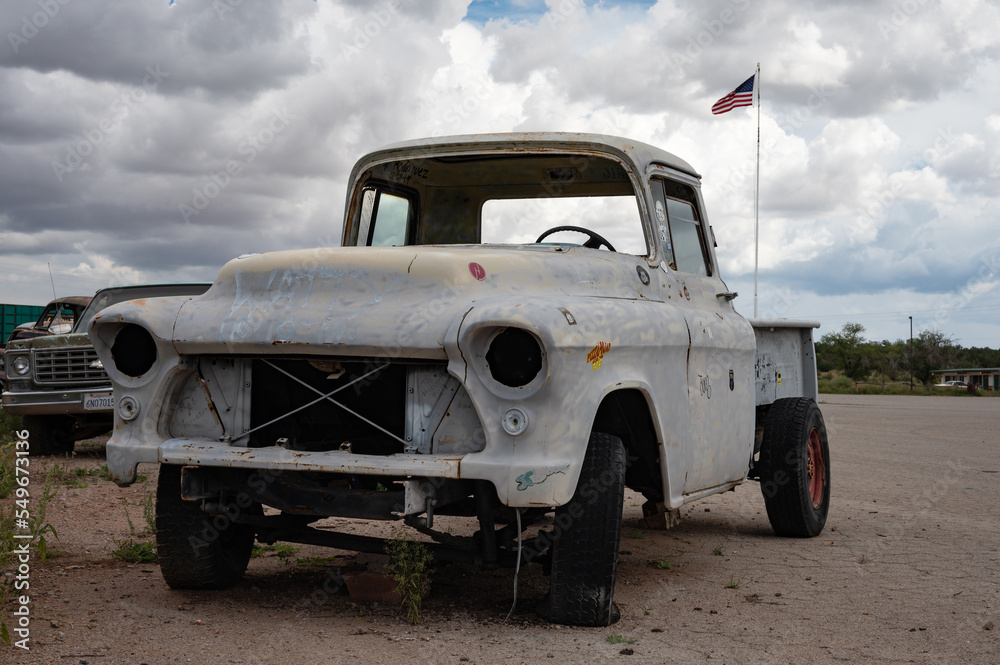 Old abandoned white pickup truck