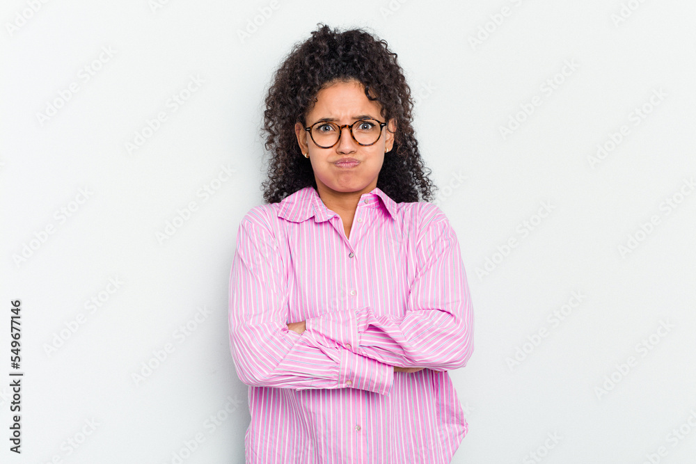 Young african american woman isolated blows cheeks, has tired expression. Facial expression concept. Young african american woman isolated blows cheeks, has tired expression. Facial expression concept.
