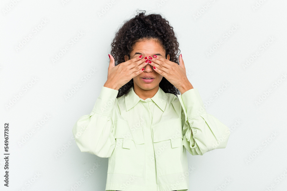 Young african american woman isolated afraid covering eyes with hands. Young african american woman isolated afraid covering eyes with hands.