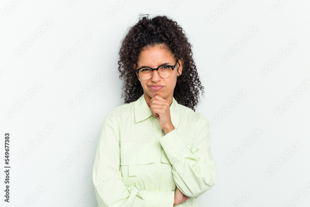 Young african american woman isolated thinking and looking up, being reflective, contemplating, having a fantasy. Young african american woman isolated thinking and looking up, being reflective, contemplating, having a fantasy.