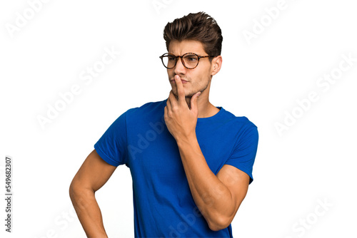Young caucasian handsome man isolated keeping a secret or asking for silence.