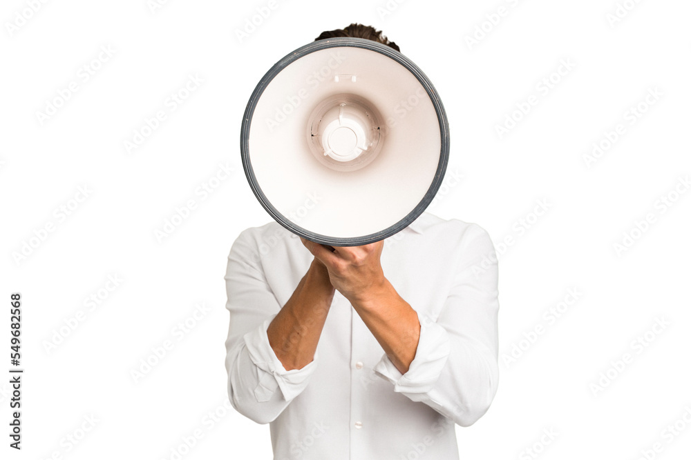 Young caucasian man screaming with a megaphone isolated Young caucasian man screaming with a megaphone isolated