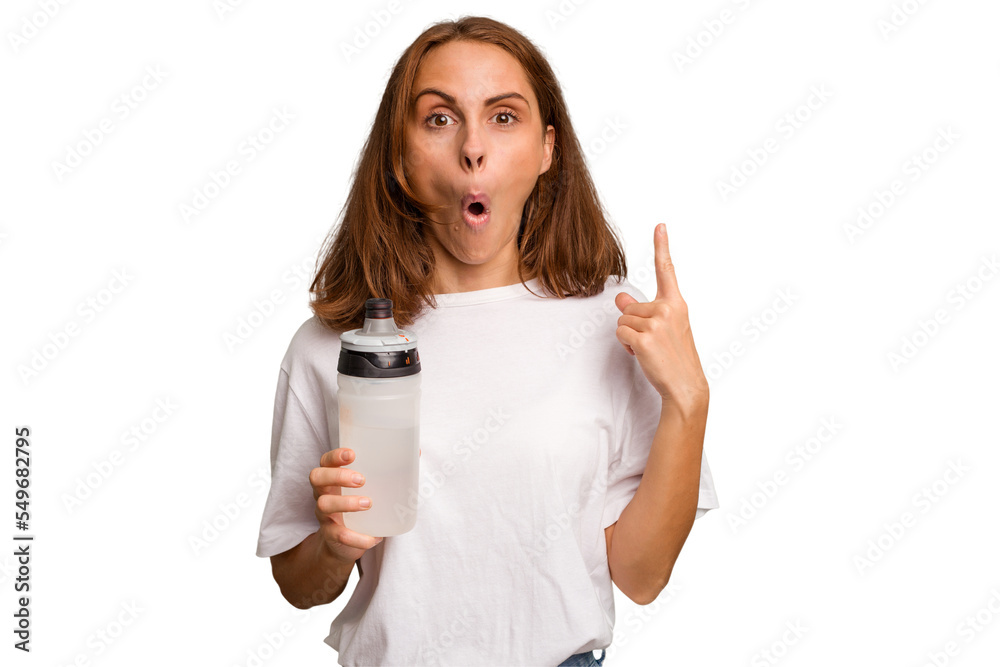 Young caucasian sport woman holding a bottle of water isolated having some great idea, concept of creativity. Young caucasian sport woman holding a bottle of water isolated having some great idea, concept of creativity.