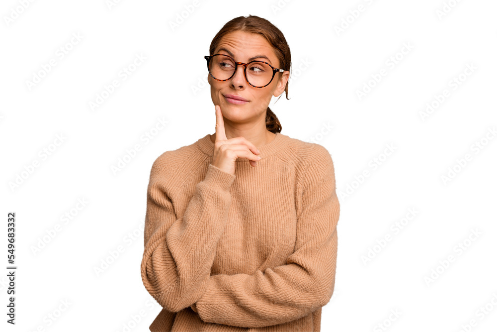 Young caucasian woman isolated contemplating, planning a strategy, thinking about the way of a business.