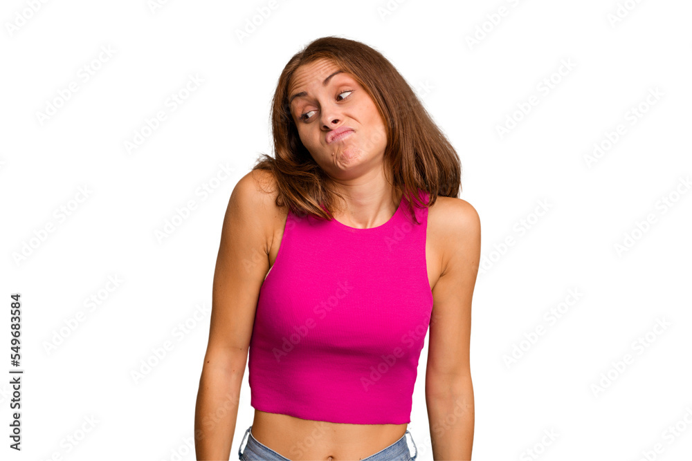 Young caucasian woman isolated shrugs shoulders and open eyes confused. Young caucasian woman isolated shrugs shoulders and open eyes confused.