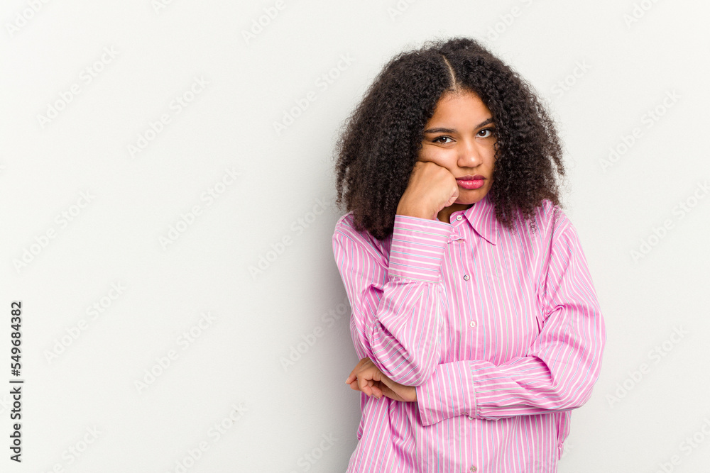 Young african american woman isolated on white background who feels sad and pensive, looking at copy space.