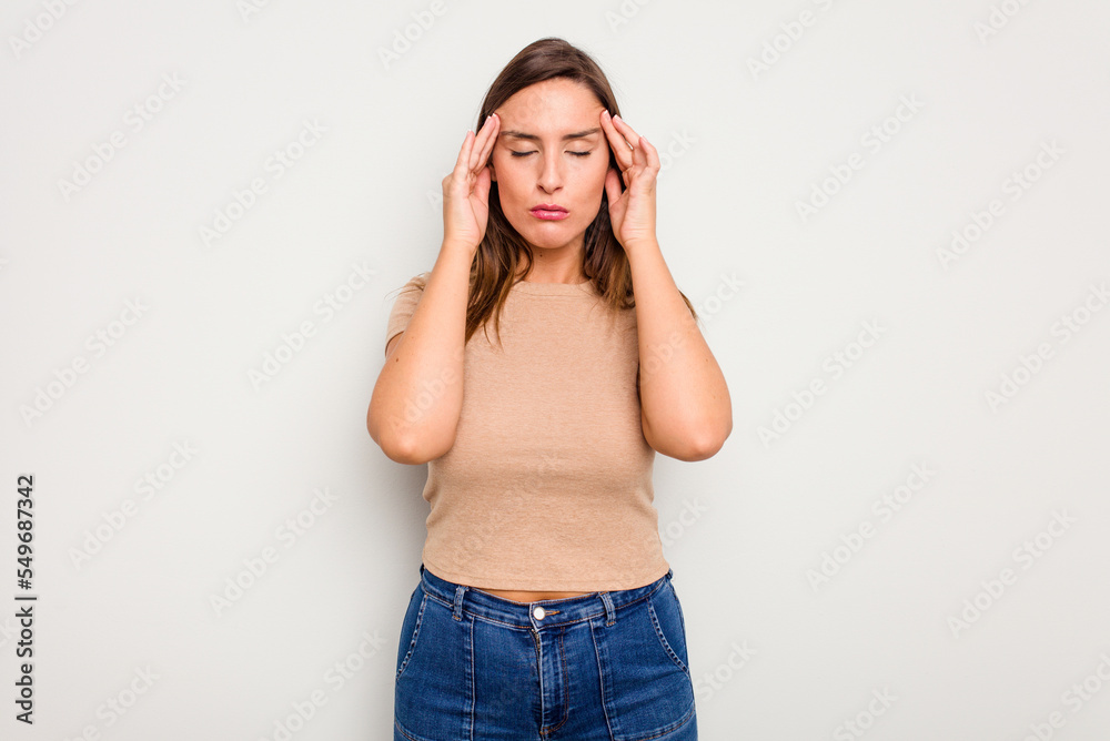 Young caucasian cute woman isolated on white background touching temples and having headache.