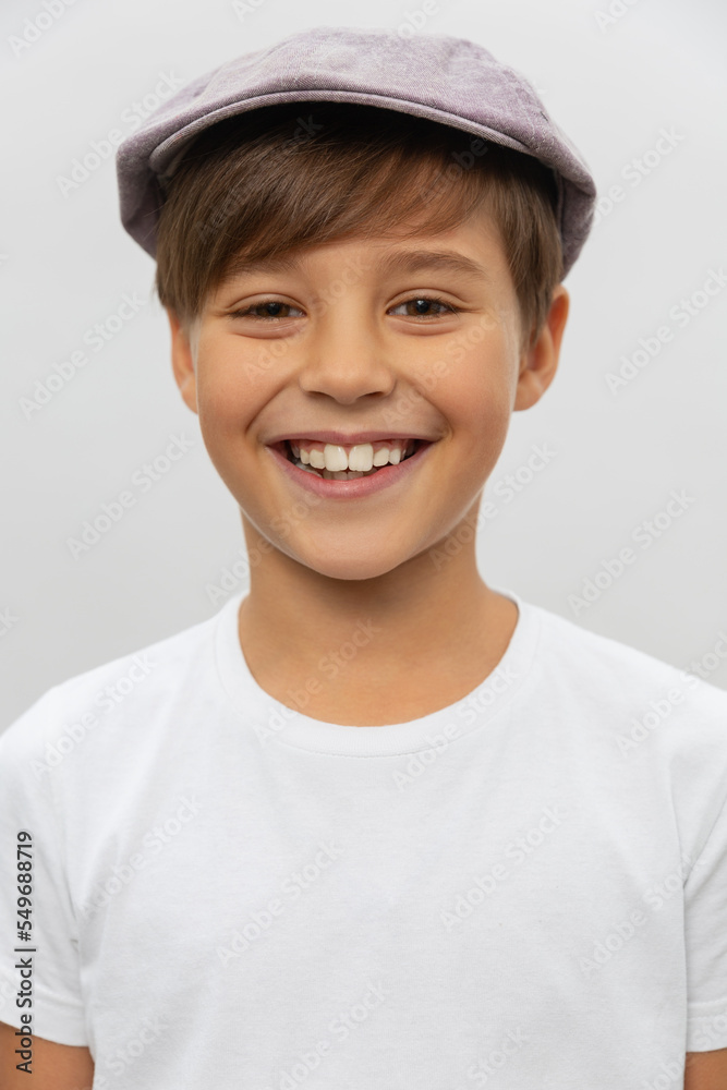 Portrait of smiling boy in a white t-shirt Portrait of smiling boy in a white t-shirt