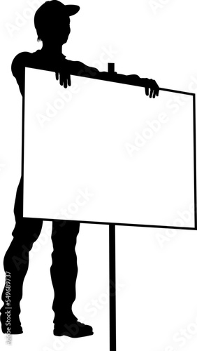 Protestor or demonstrator at a demonstration march, picket line or strike protest rally in silhouette. Holding up a banner or picket sign board placard.