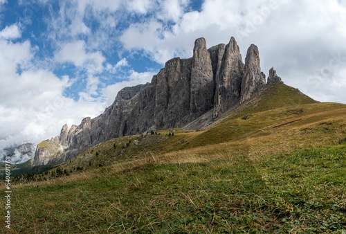 Cloudy blue sky over Dolomites, Alps, Groeden, Sella Pass, South Tyrol, Italy photo