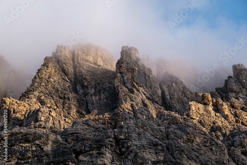 Cloudy blue sky over Dolomites, Alps, Groeden, Sella Pass, South Tyrol, Italy photo