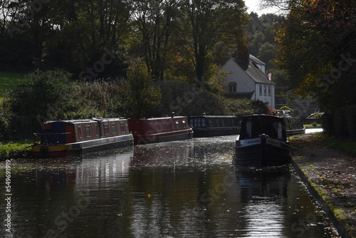 canal boats docked on the side of the canal at the Stewponey in Stourton photo