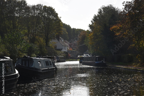 canal boats docked on the side of the canal at the Stewponey in Stourton photo