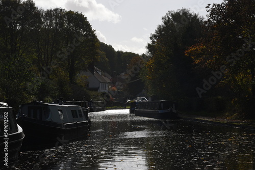 canal boats docked on the side of the canal at the Stewponey in Stourton photo