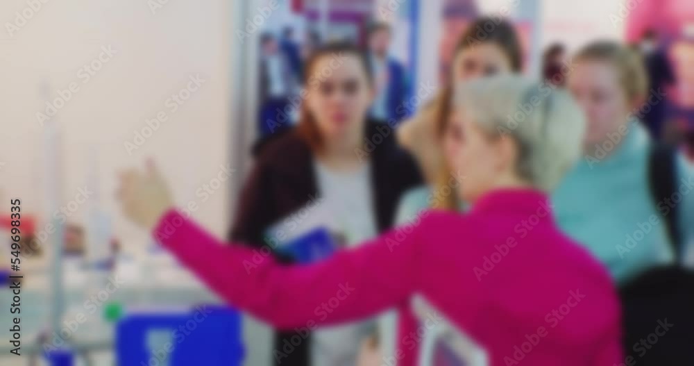 Modern business life.Blurred defocused video on business topic.Silhouettes of unrecognizable people who are holding a business meeting.