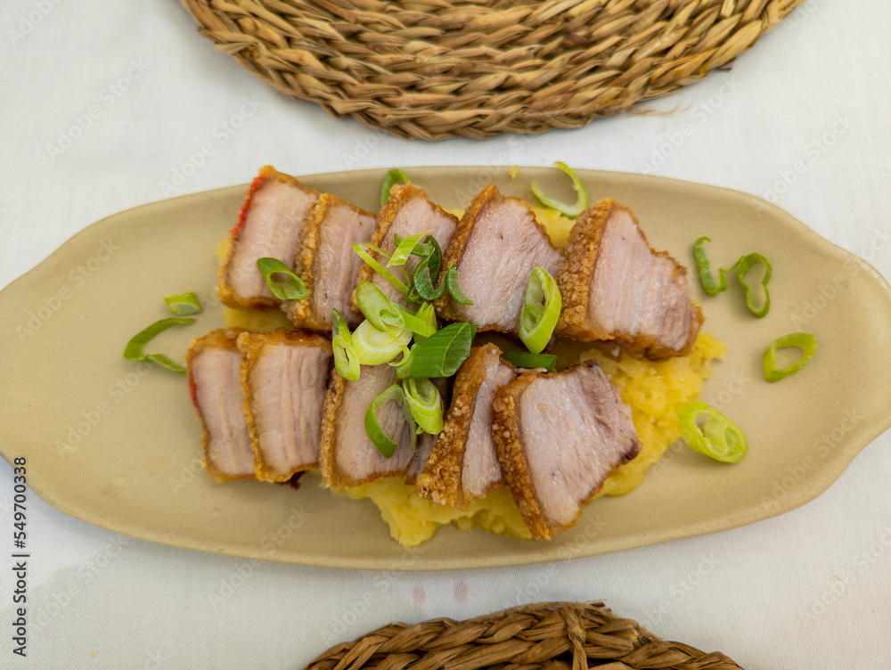 Gourmet, Typical Spanish dish called torreznos, consisting of deep-fried pork skin and savory fried crust Gourmet, Typical Spanish dish called torreznos, consisting of deep-fried pork skin and savory fried crust