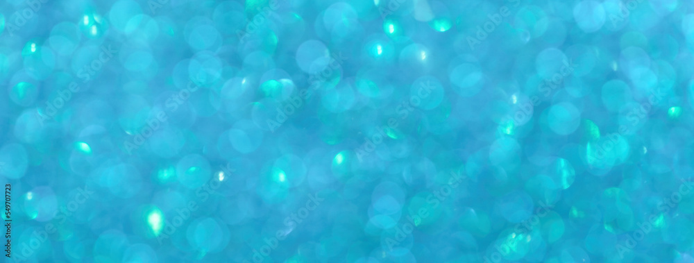 Blurred blue and turquoise sparkling background from small sequins, macro. Cerulean defocused backdrop Blurred blue and turquoise sparkling background from small sequins, macro. Cerulean defocused backdrop