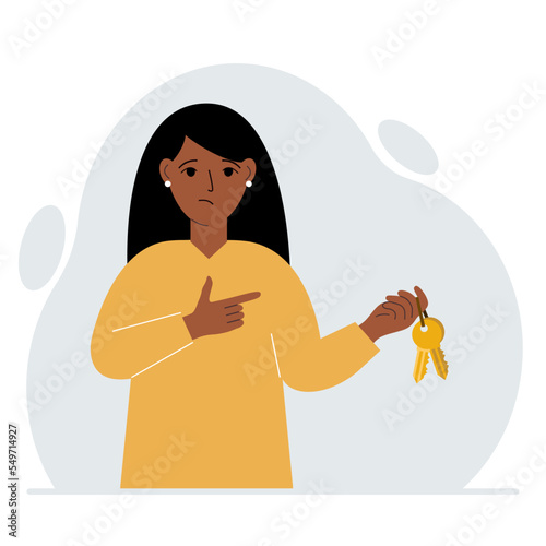A woman holds a bunch of golden keys to open a locked door. Knowledge or the key to success.