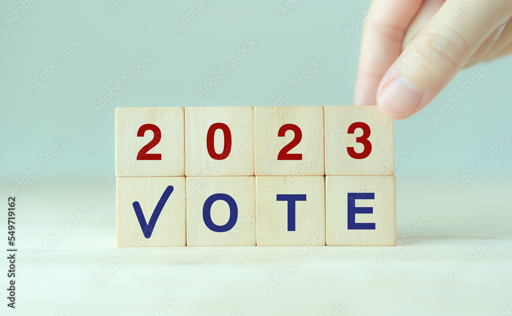 Stockfoto Election vote in 2023 concept. Vote word with checkmark