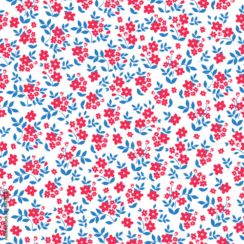 Cute floral pattern. Seamless vector texture. An elegant template for fashionable prints. Print with small red flowers and blue leaves. white background.