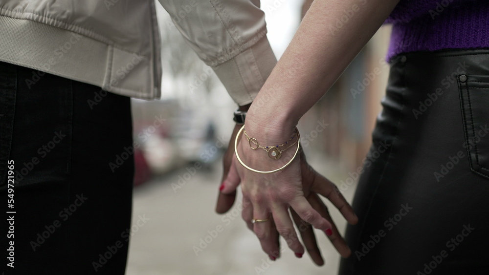 Couple disjoining hands, lovers separating