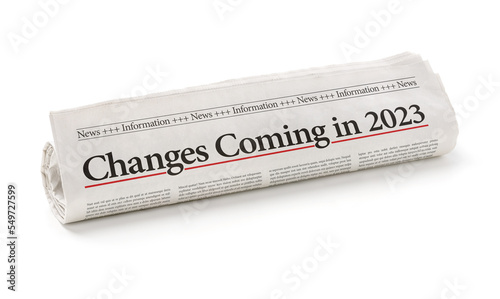  Rolled newspaper with the headline Changes coming in 2023
