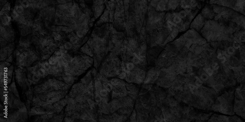 Ancient and grainy Black Emperador marble texture with various cracks  dusty and cracked old wall texture  dark black and grainy Concrete floor or old grunge  old blackboard or chalkboard texture.