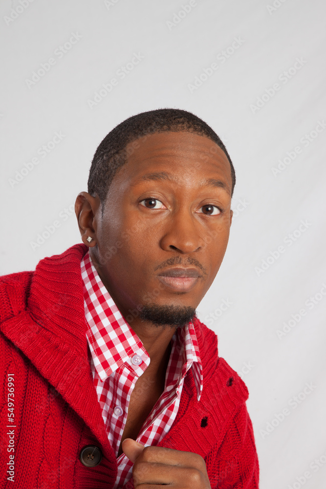 Handsome Black man in a red jacket Handsome Black man in a red jacket