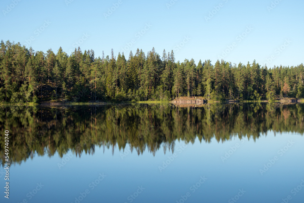 symmetrical landscape with reflection on the lake symmetrical landscape with reflection on the lake