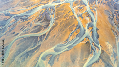 Aerial view of abstract water formation near Olfusa river bank in Iceland. photo
